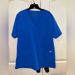 Women’s royal blue FIGS 2 pocket scrub top